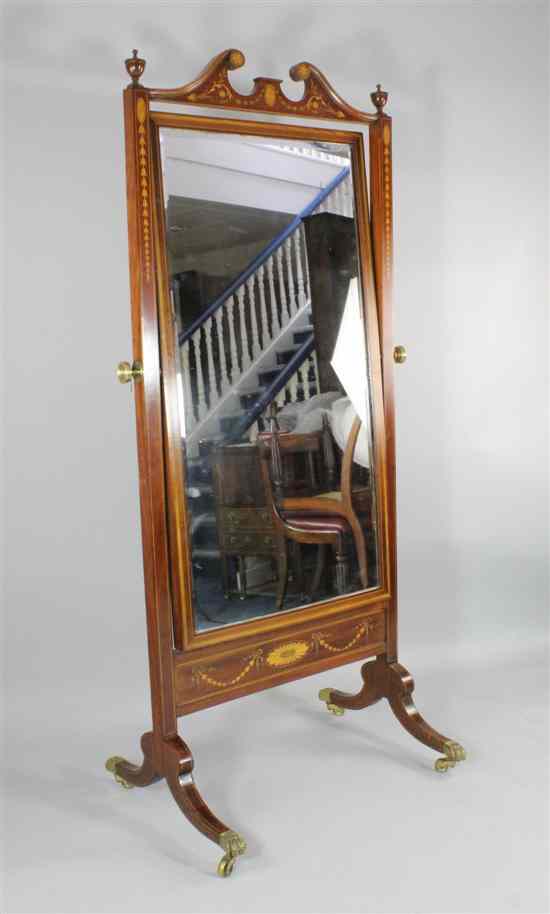 Appraisal: An Edwardian satinwood inlaid mahogany cheval mirror of Adam design