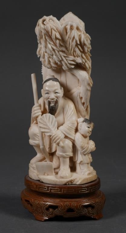 Appraisal: Nice antique Chinese carving of a farmer and a child