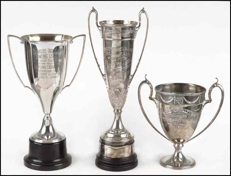 Appraisal: THREE SILVERPLATE BOWLING TROPHIES Dated and Tallest '' Condition No