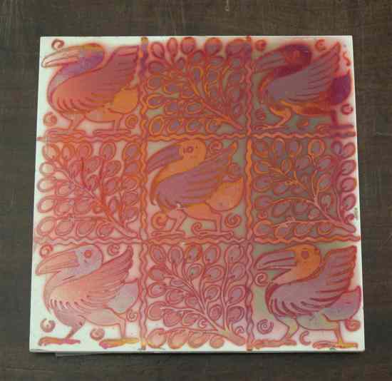 Appraisal: A Craven Dunhill Co ruby lustre tile c decorated with