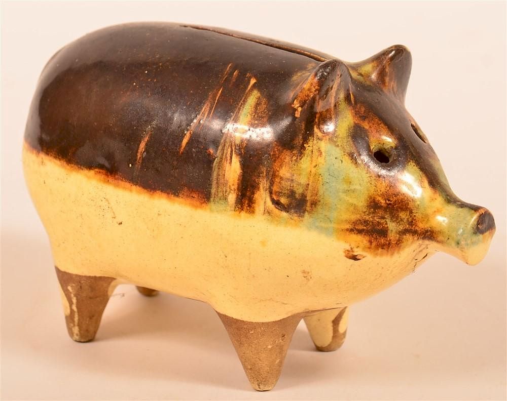 Appraisal: Earthenware Pig Form Still Bank Brown and Blue Mottle Glazed