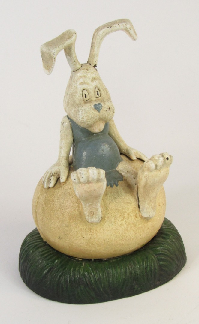 Appraisal: A cast iron comic rabbit money box cm high