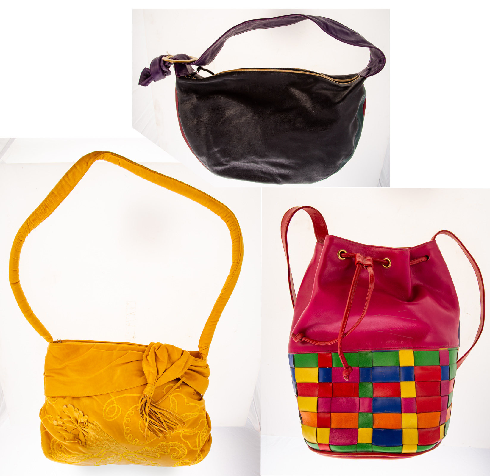 Appraisal: THREE COLORFUL LEATHER HANDBAGS early s including a Susan Gail