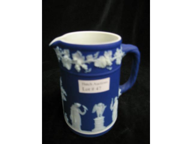 Appraisal: Wedgwood Dark Blue Jasperware Milk Pitcher classical maidens in the