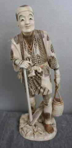 Appraisal: Signed Asian Ivory of Man Carrying Basket Incised and dyed