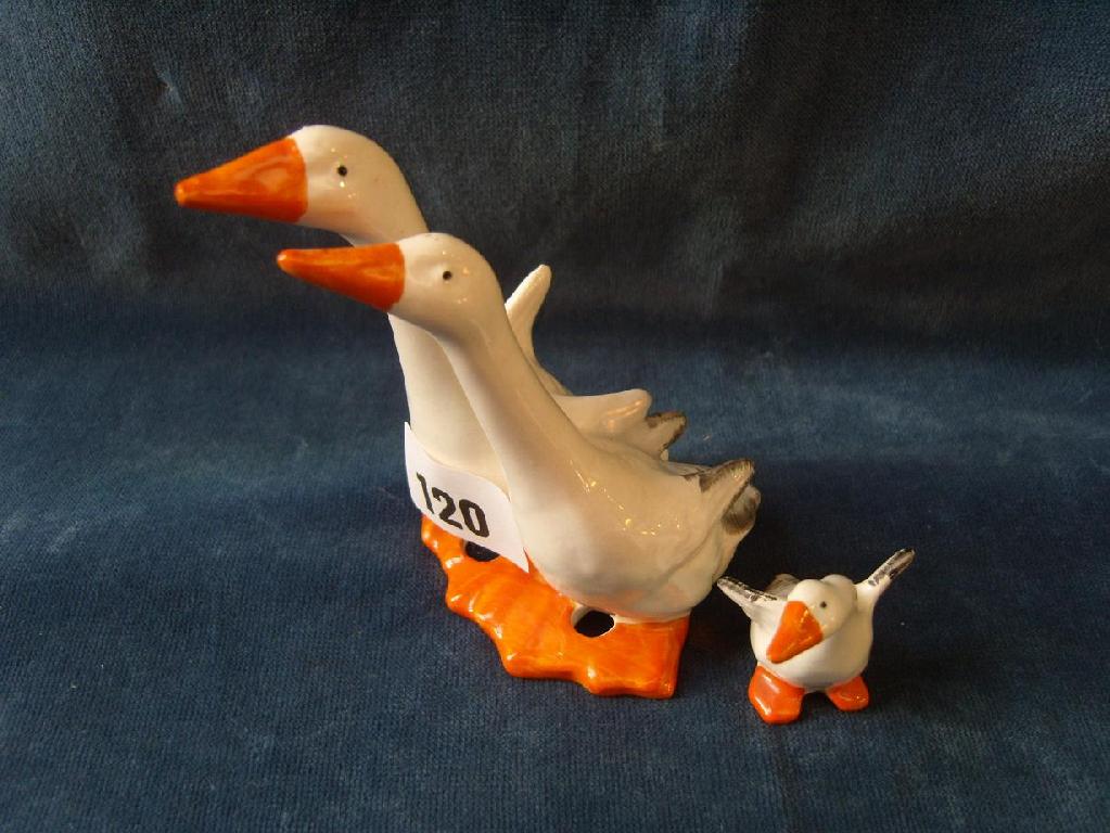 Appraisal: A Beswick group of a pair of humorous geese with