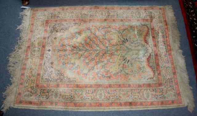 Appraisal: A PERSIAN RUG woven with tree of life design on