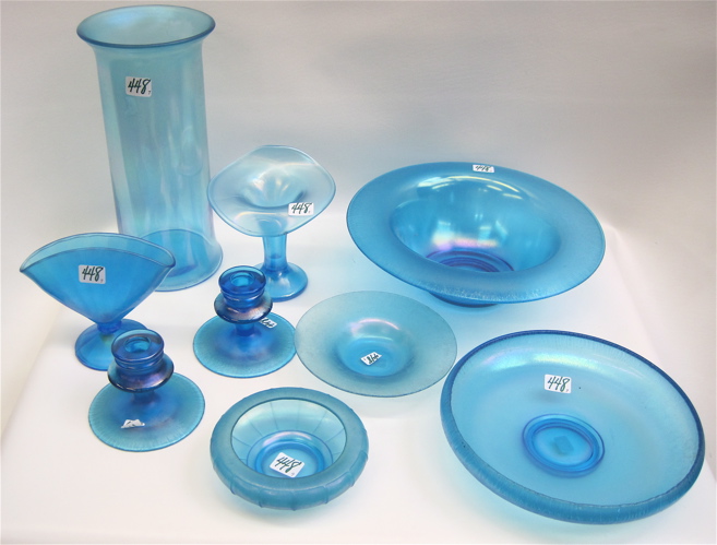 Appraisal: NINE PIECES OF BLUE STRETCH GLASS bowls from to D