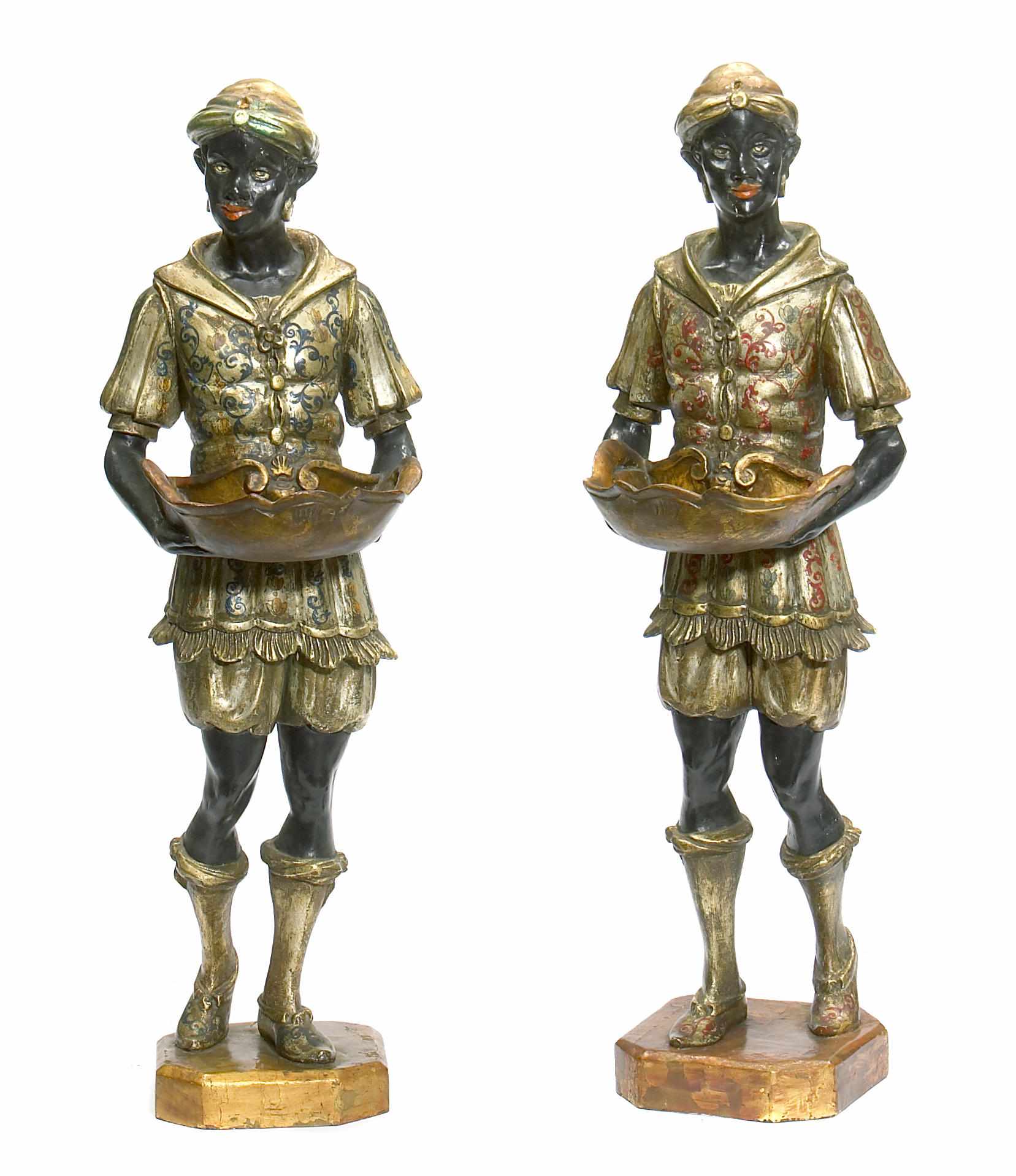 Appraisal: A pair of Venetian Rococo style polychrome decorated figures of