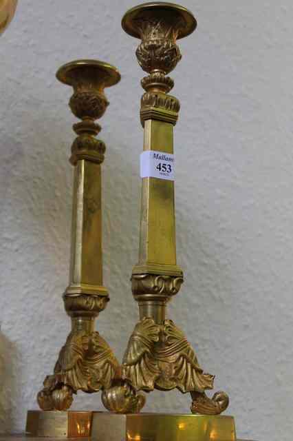 Appraisal: A PAIR OF FRENCH EMPIRE ORMULU CANDLESTICKS of tricorn form