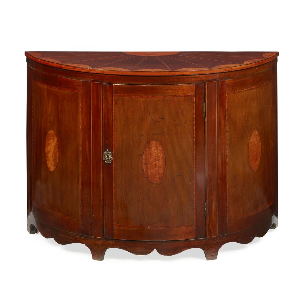 Appraisal: GEORGE III MAHOGANY AND SATINWOOD DEMILUNE COMMODE TH CENTURY the