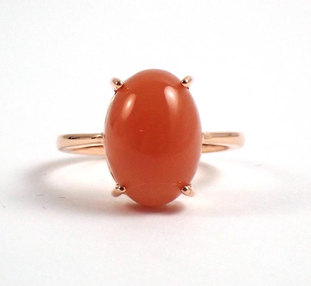 Appraisal: ORANGE MOONSTONE AND FOURTEEN KARAT GOLD RING The k rose