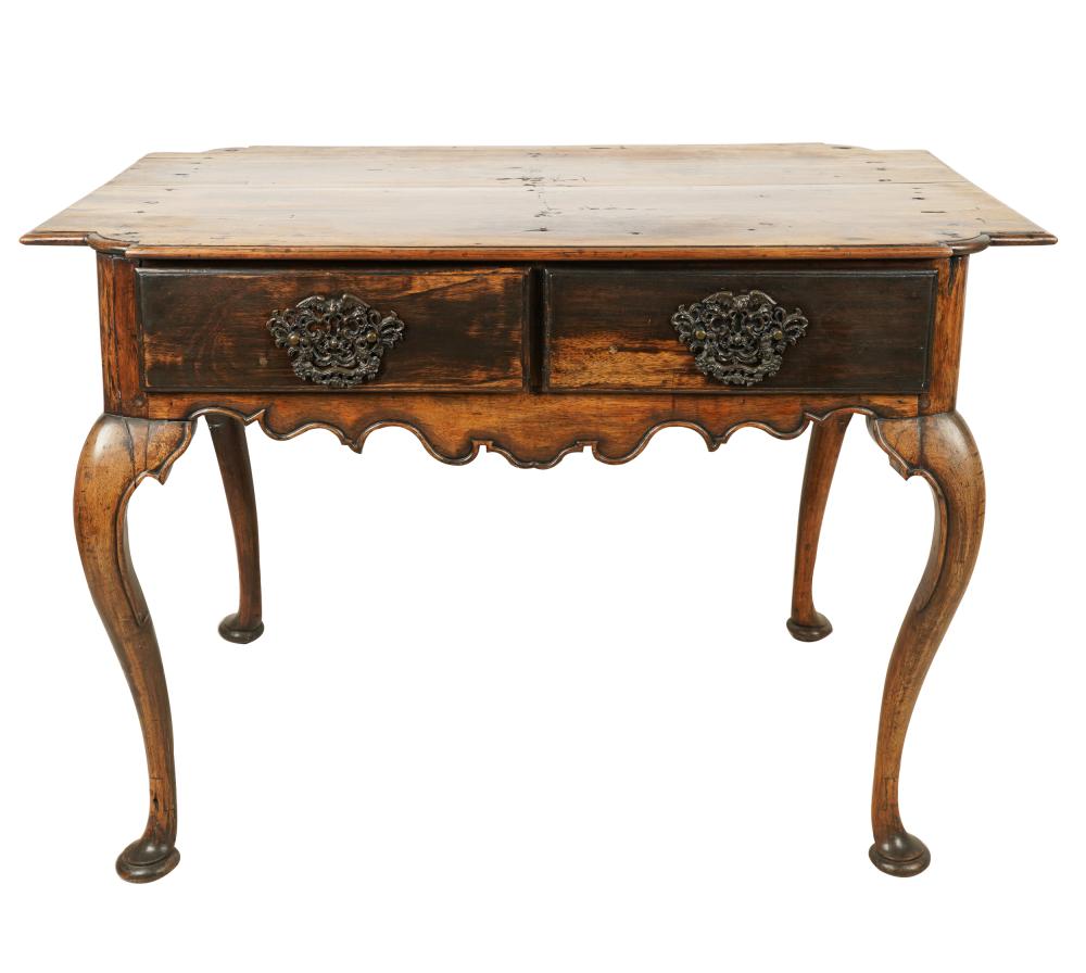 Appraisal: CARVED FRUITWOOD WRITING TABLEwith two drawers Condition hardware replaced fading