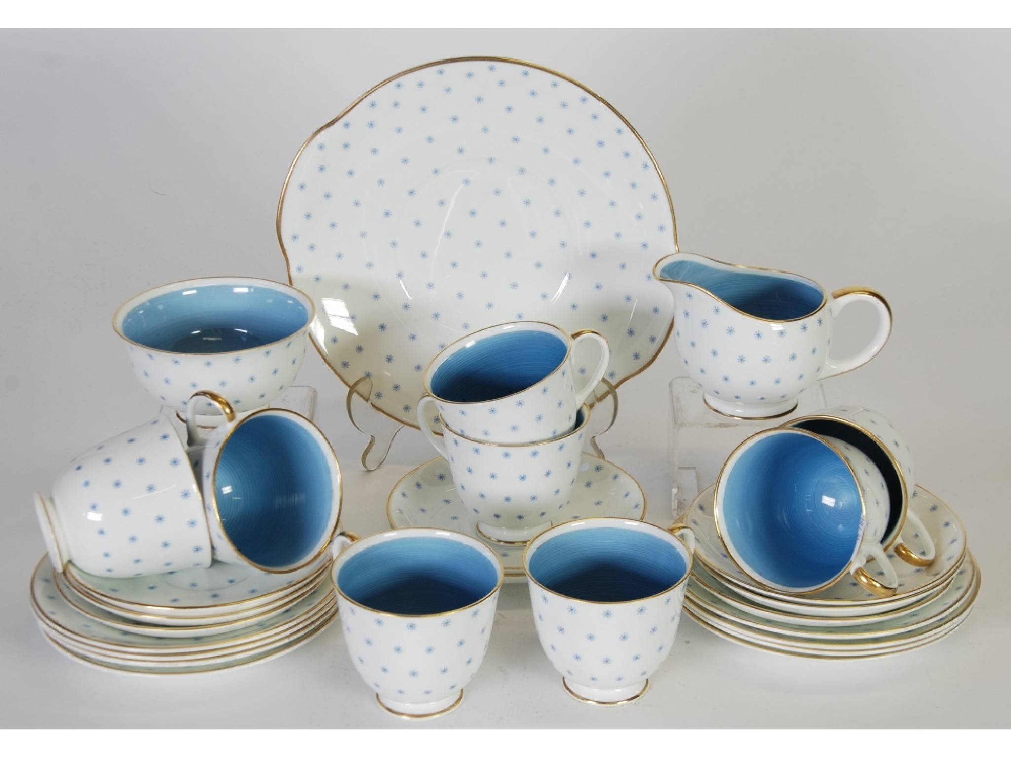 Appraisal: TWENTY SEVEN PIECE SUSIE COOPER ASTERIX PATTERN CHINA TEA SERVICE