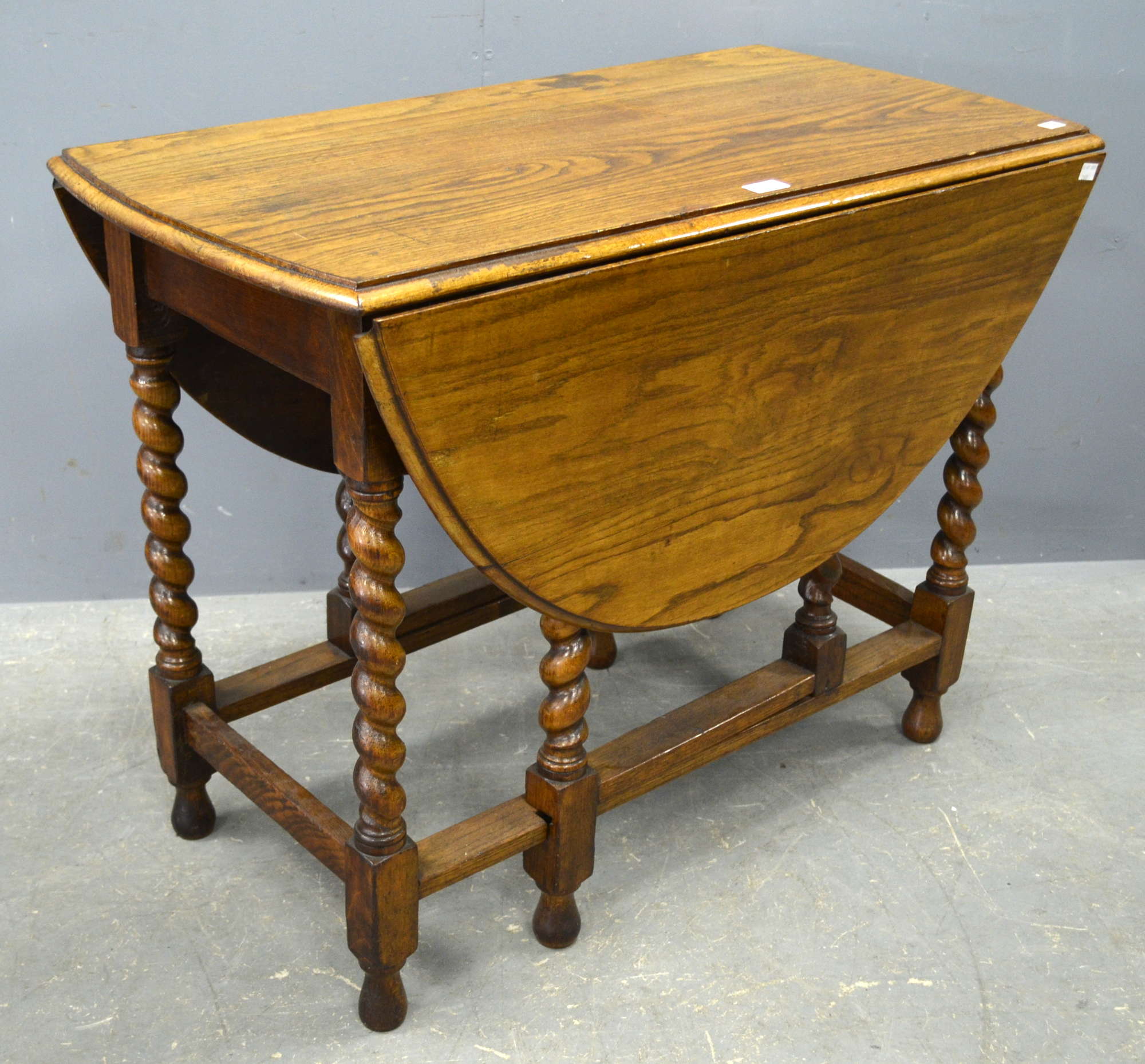 Appraisal: Oak gateleg table on barley twist supports