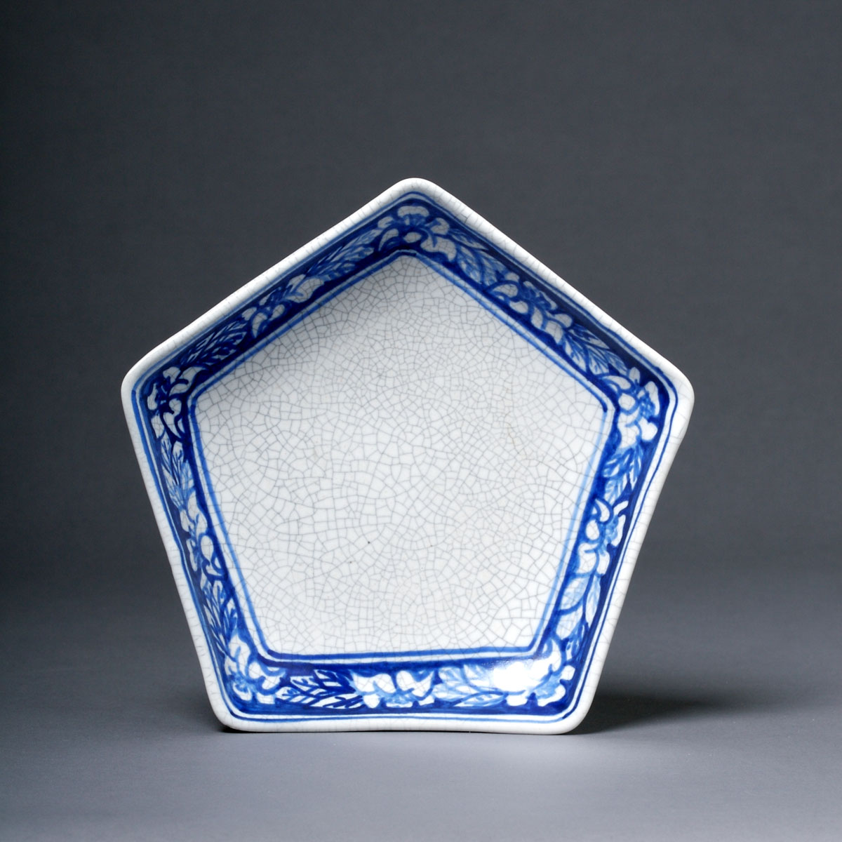 Appraisal: DEDHAM POTTERY 'AZALEA' PATTERN PENTAGONAL 'STAR' DISH Painted in dark