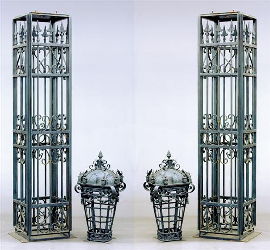 Appraisal: Pair wrought-iron gate posts with lanterns domed latticework basket adorned