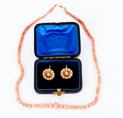 Appraisal: A pair of Edwardian coral and pearl earrings of flowerhead