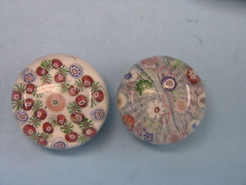 Appraisal: Two mid th century French glass paperweights millefiori with upset