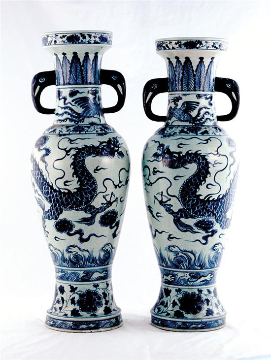 Appraisal: Pair Chinese Export blue-and-white vases urn form decorated with dragons