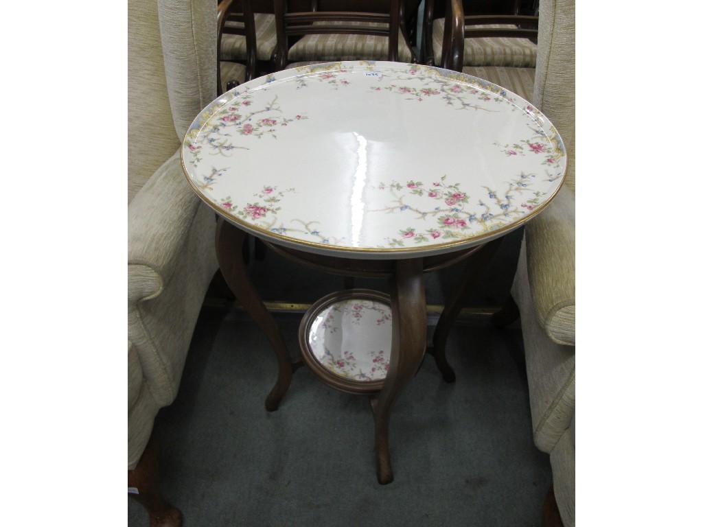 Appraisal: Two tier occasional table with ceramic inserts