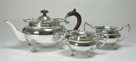 Appraisal: A three piece tea set Martin Hall Co Sheffield comprising