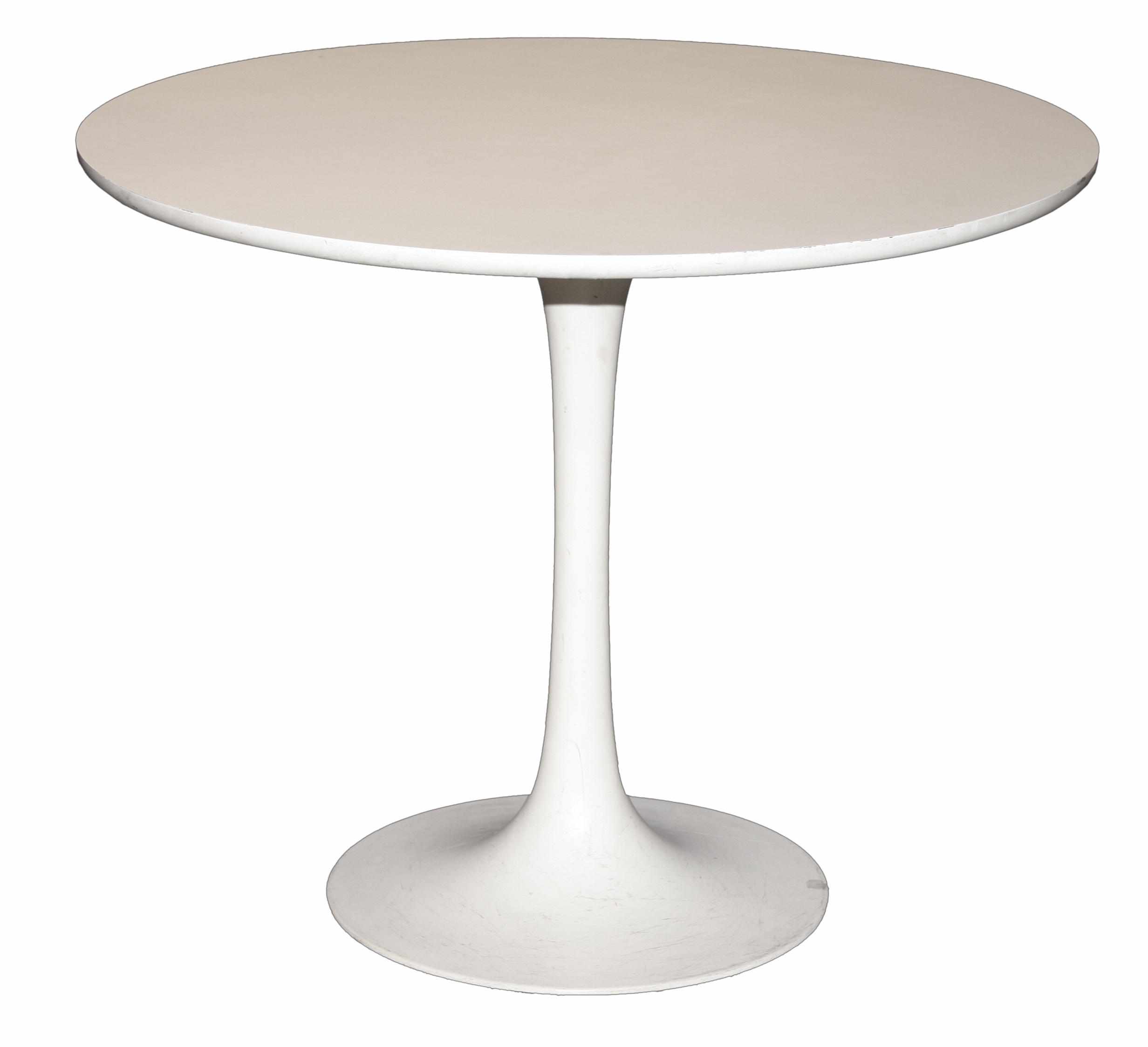 Appraisal: An Eero Saarinen laminated and enameled metal circular tulip dining