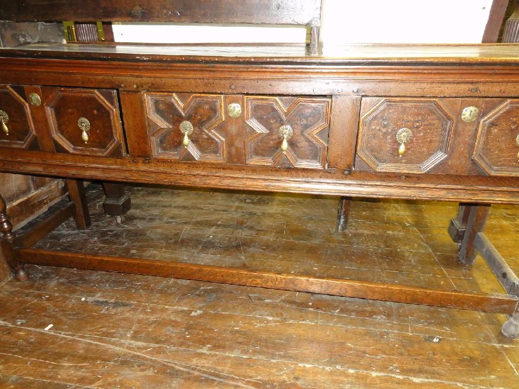 Appraisal: A Georgian oak dresser base the frieze fitted with two