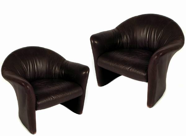 Appraisal: A pair of Nienkampre purple leather upholstered club chairs height