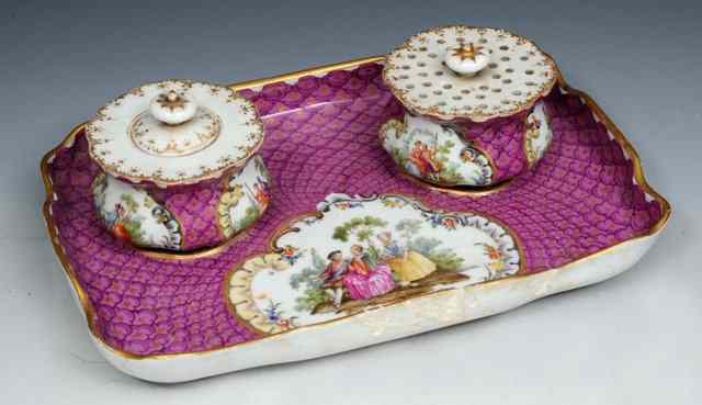 Appraisal: A MEISSEN PORCELAIN DESK STAND decorated with reserve panels of