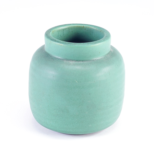 Appraisal: TECO Barrell-shaped ridged vessel in smooth matte green glaze with