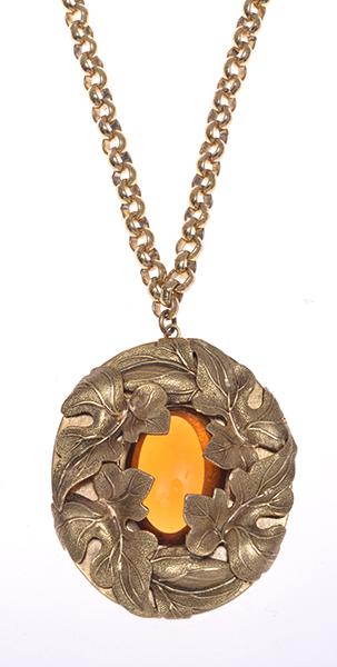 Appraisal: AN ORANGE PASTE SET PENDANT ON CHAIN SIGNED WHITING DAVIS