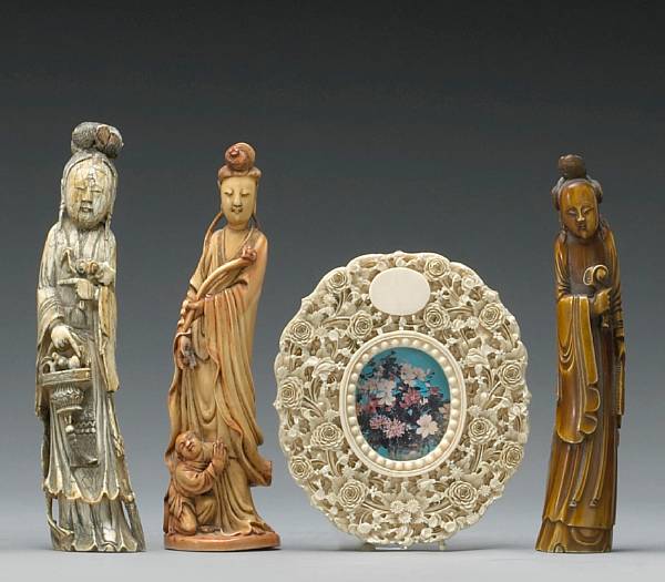 Appraisal: Three tinted ivory standing female figures Qing Dynasty The first