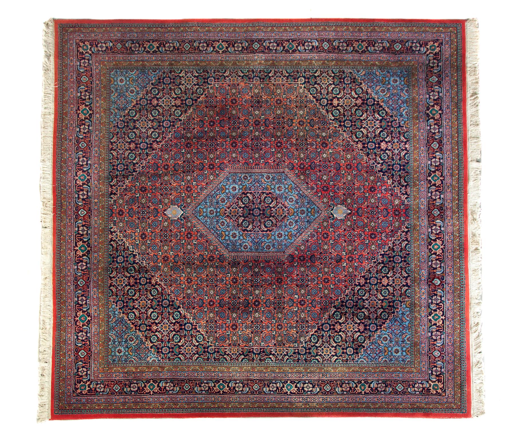 Appraisal: PERSIAN ROOM SIZE RUG Twentieth century Geometric patterns with vivid