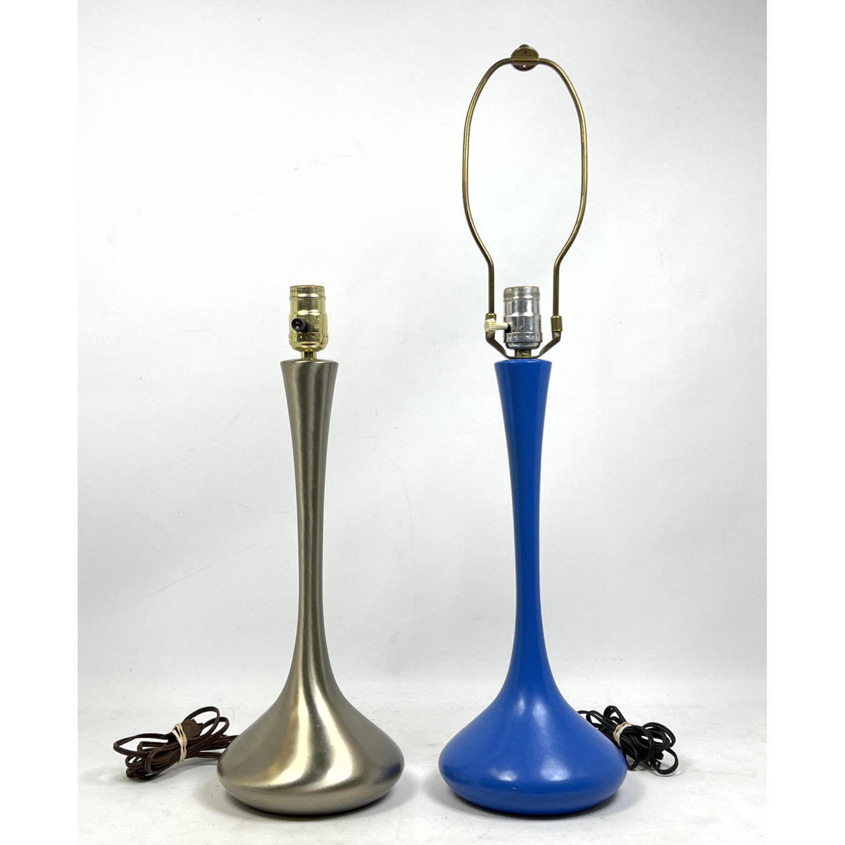 Appraisal: pc Metal Modernist Table Lamps One stainless One painted blue