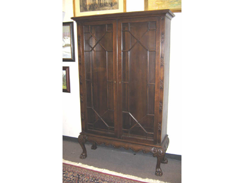 Appraisal: CHIPPENDALE STYLE MAHOGANY DISPLAY CABINET Flat top over the pair