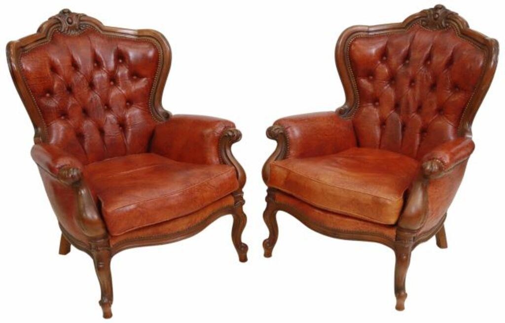 Appraisal: pair Italian wingback leather armchairs th c having carved crest