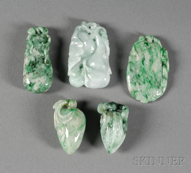 Appraisal: Five Jade Pendants green with bright green markings carving of