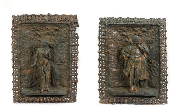 Appraisal: A pair of patinated metal wall plaques of classical figures