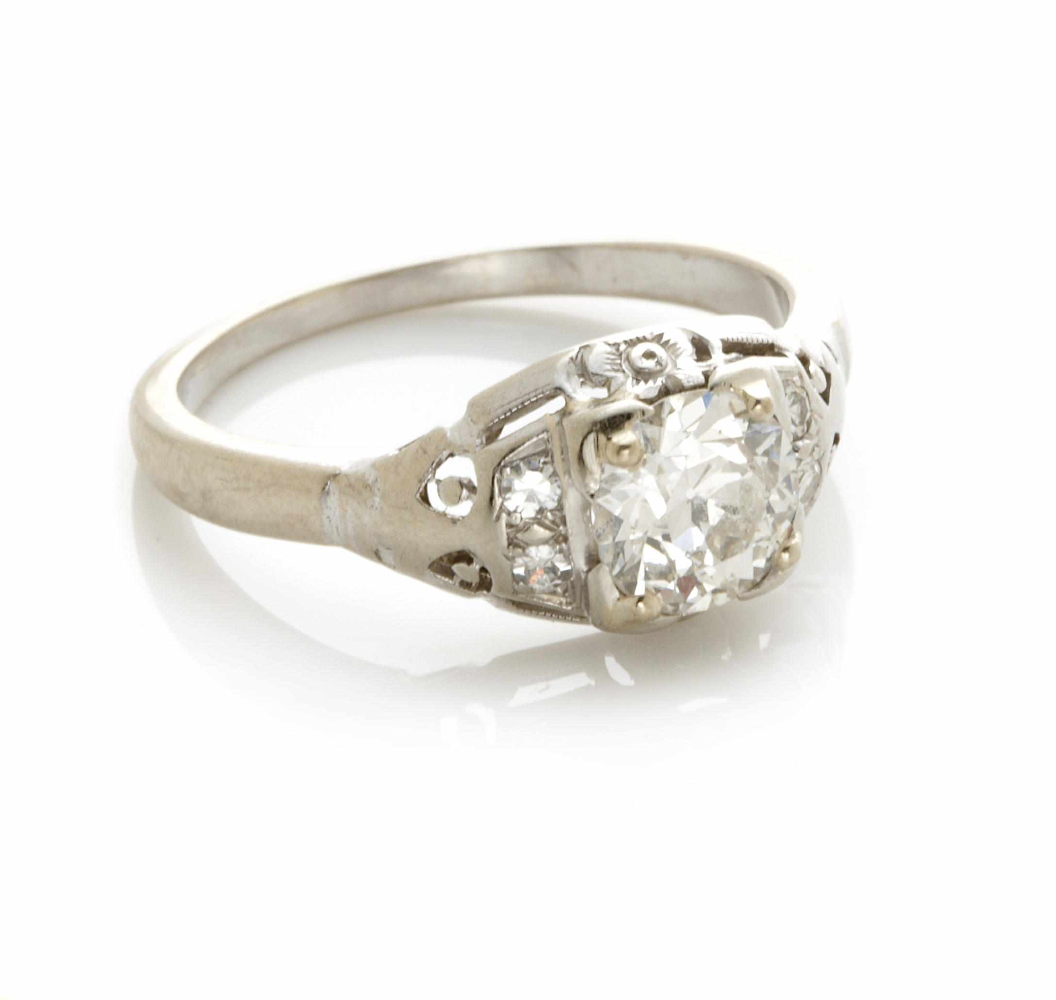 Appraisal: A diamond and white gold solitaire ring featuring an old