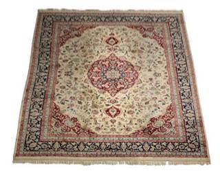 Appraisal: Hand-knotted Sino-Isfahan wool rug having a crimson medallion with pendants