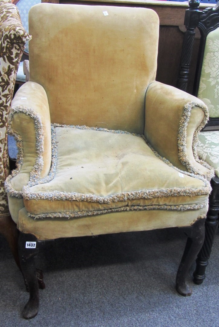 Appraisal: An early th century and later low square back armchair