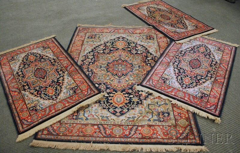 Appraisal: Four Oriental-style Machine-Made Rugs Karastan th century one ft x