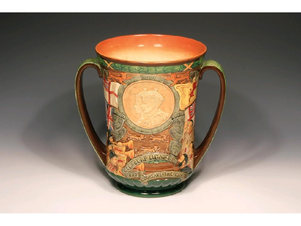 Appraisal: A LARGE ROYAL DOULTON LIMITED EDITION LOVING CUP modelled by