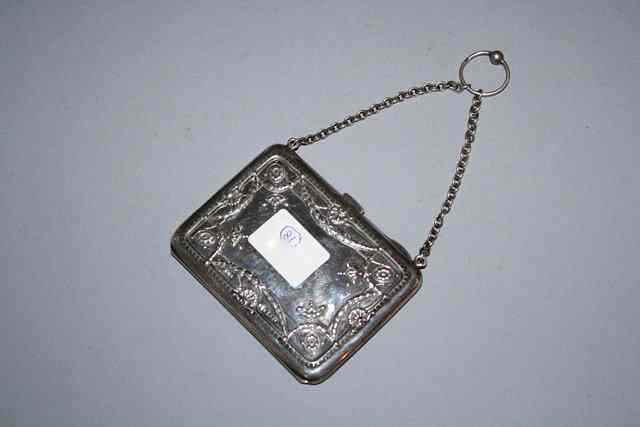 Appraisal: A GEORGE V SILVER PURSE rectangular shaped with press shell