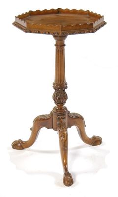 Appraisal: A mahogany tripod table in George III style the galleried