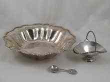 Appraisal: An standard silver lobed bowl with beaten finish together with