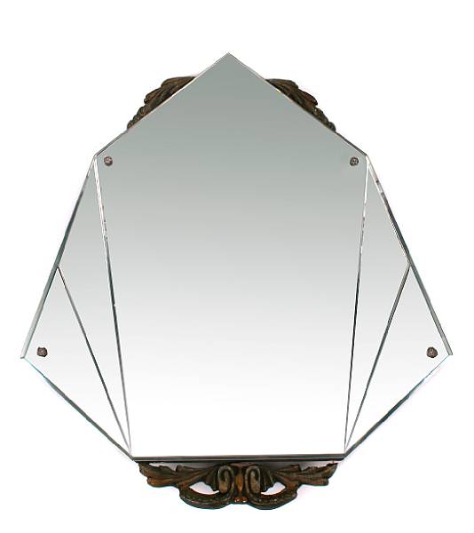 Appraisal: An Art Deco silvered wood mounted mirror height in width