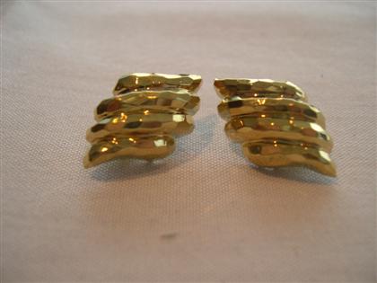 Appraisal: karat yellow gold earrings Yellow gold earrings composed of four