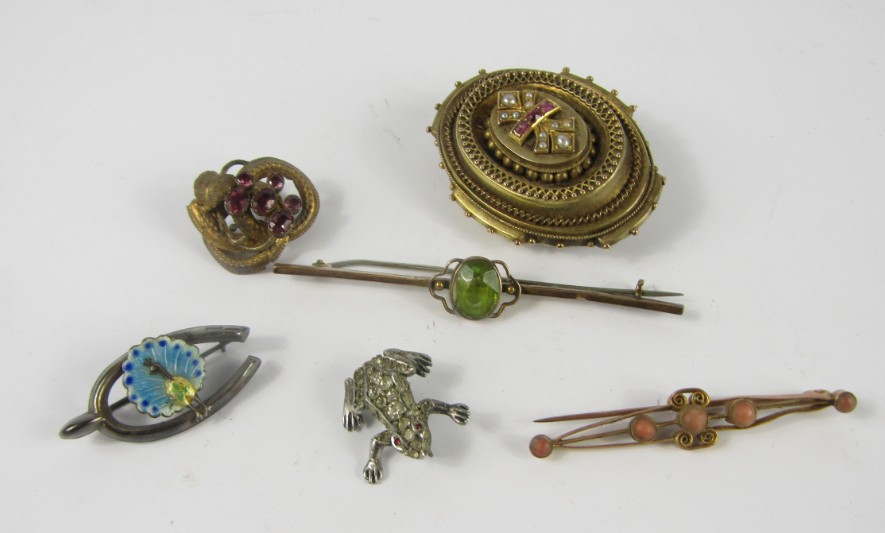 Appraisal: A yellow metal and coral bar brooch and a yellow